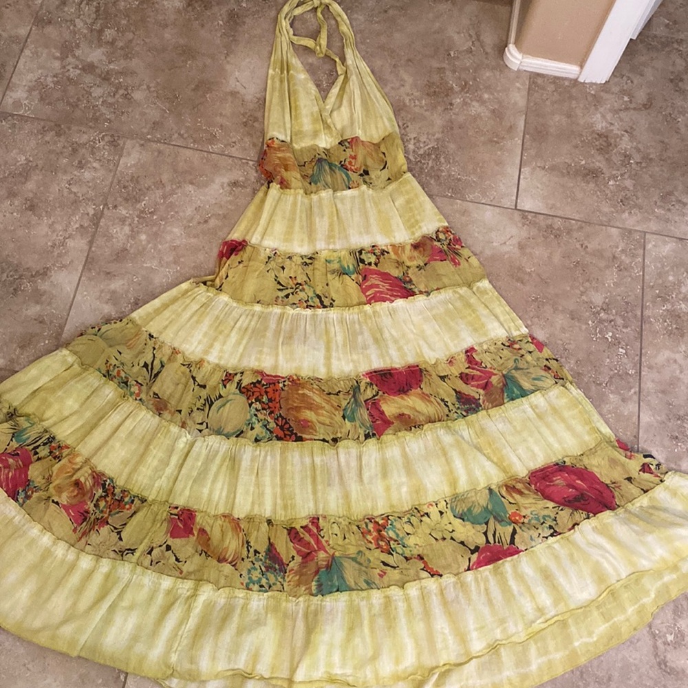 Gorgeous maxi dress with open back. Light and amazing detail.